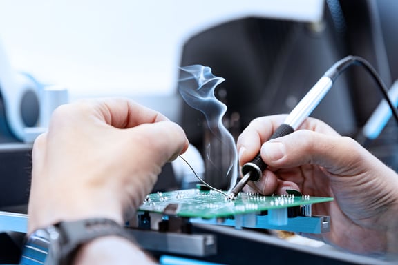 Working at Systec: soldering circuit boards